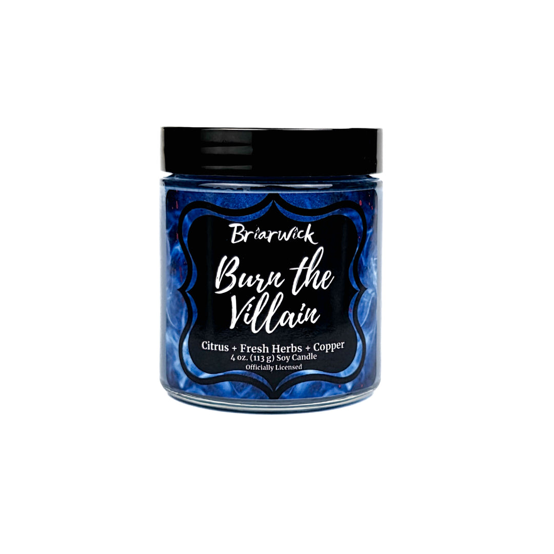 Jar of candle labeled 'Burn the Villain' by Briarwick on a white background