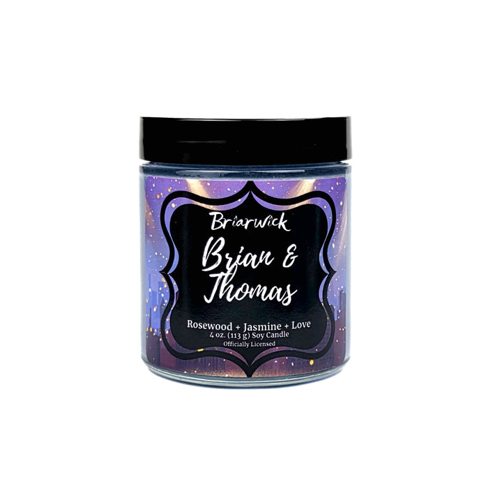Jar of Briarwick Brian & Thomas candle with a purple label on a white background