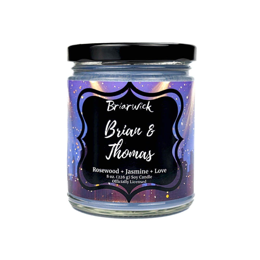 Candle jar with a purple label called "Brian & Thomas" featuring the brand 'Briarwick' and product details.