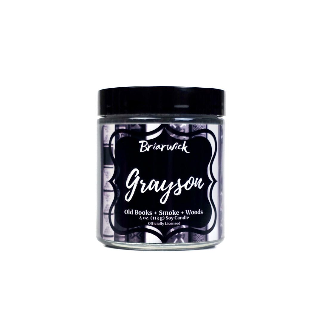 Candle jar labeled 'Grayson' by Briarwick on a white background
