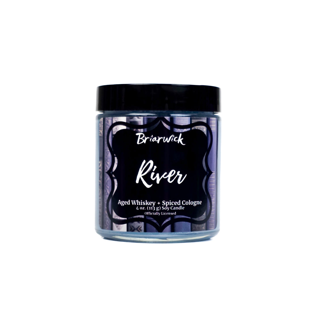 Candle jar labeled 'River' by Briarwick on a white background