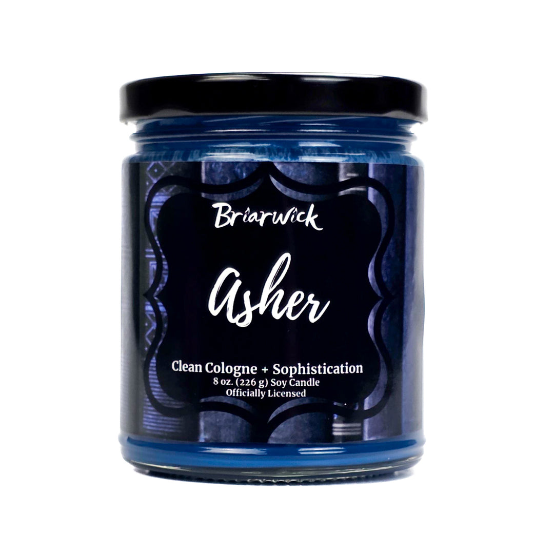 Jar of Briarwick Asher candle with black lid and label on a white background