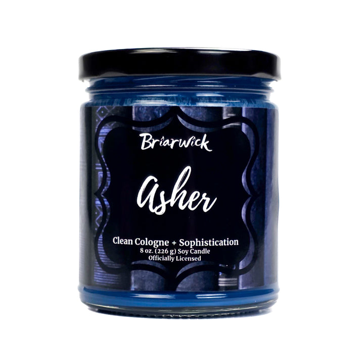 Jar of Briarwick Asher candle with black lid and label on a white background