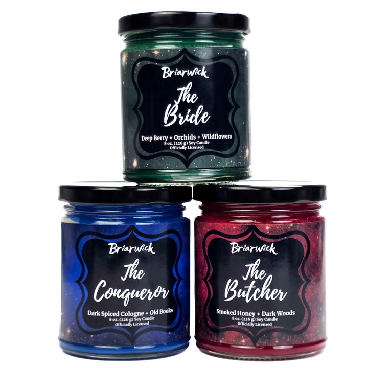 Three candles with labels 'The Bride', 'The Conqueror', and 'The Butcher' from Briarwick on a white background.