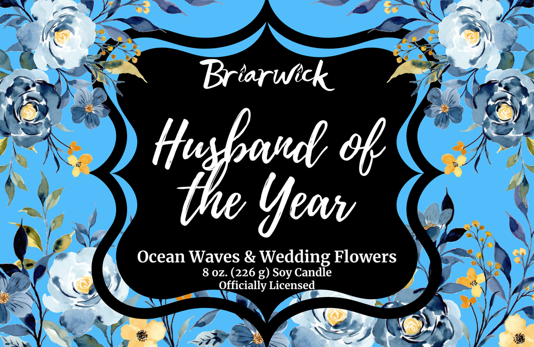 Blue Husband of the Year candle label with blue and white flowers
