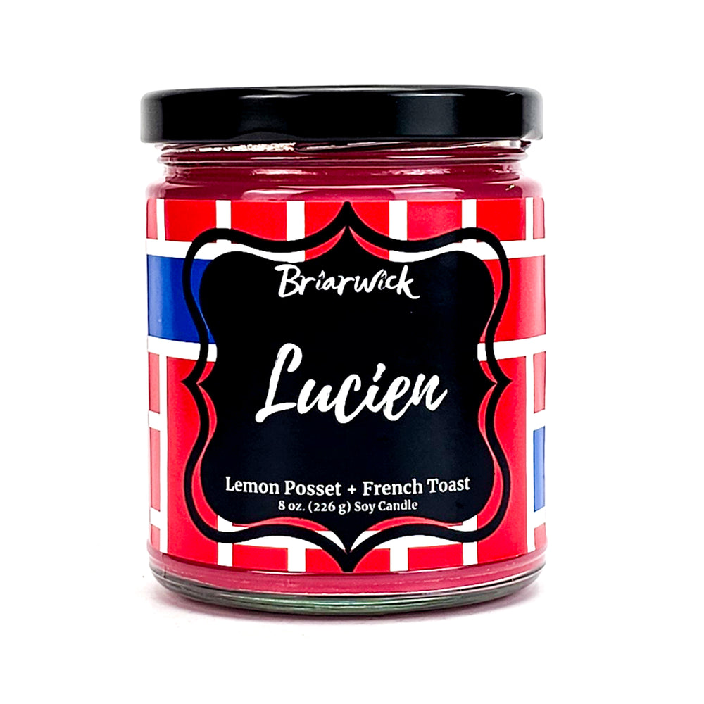 Jar of Briarwick Lucien candle with red and white striped label