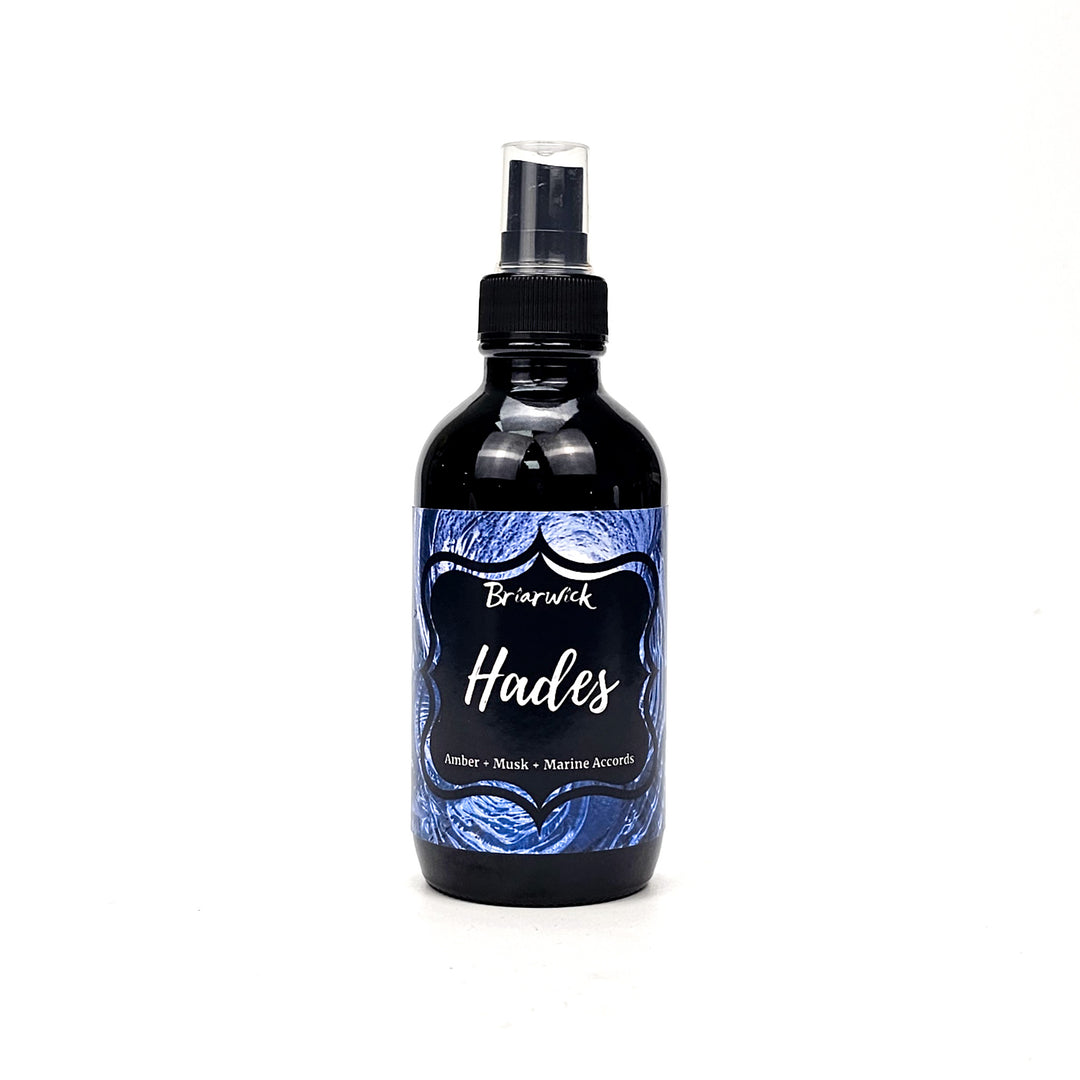 Hades 4oz Linen Spray with blue spiral design on a white background