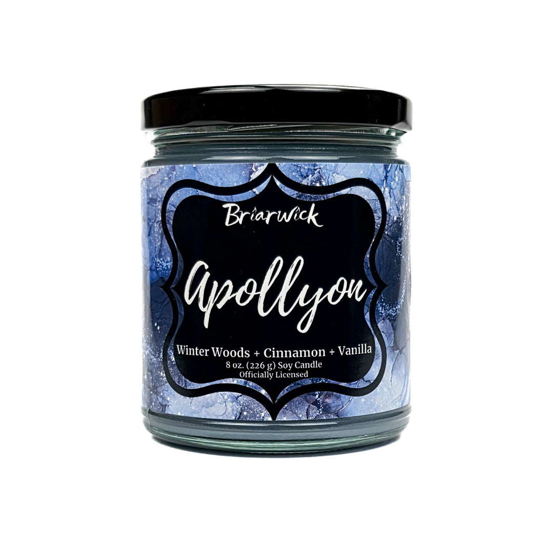 Apollyon 8oz light blue candle with blue and silver marbled glitter label on a white background