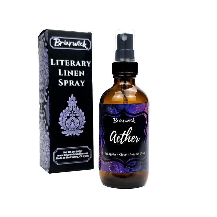 Aether 4oz Linen Spray with purple and gold marbled glitter label on a white background