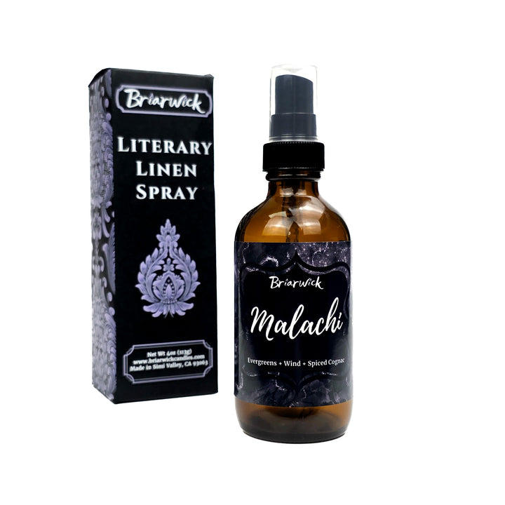 Malachi 4oz Linen Spray with black and silver marbled glitter label on a white background