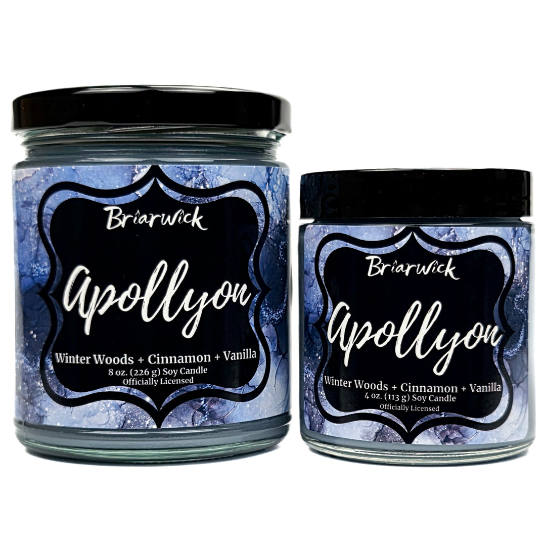 Apollyon 8oz & 4oz light blue candle with blue and silver marbled glitter label on a white background