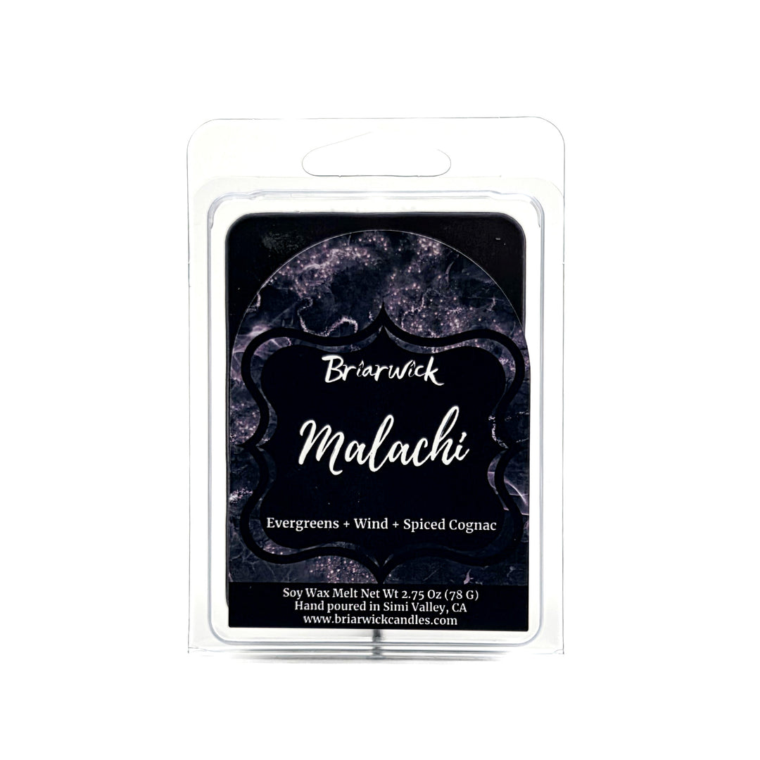 Malachi 2oz black wax melt with black and silver marbled glitter label on a white background