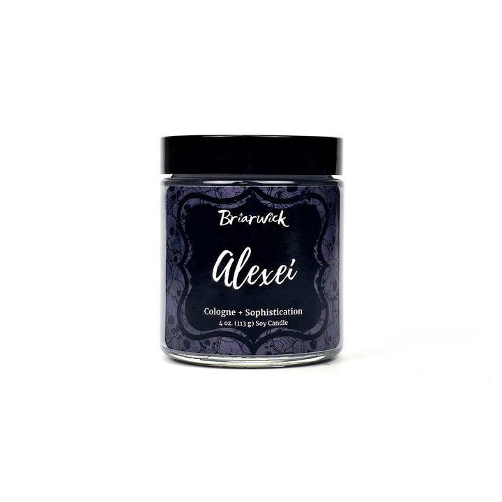 Alexei 4oz flint gray candle with gray skull design on a white background
