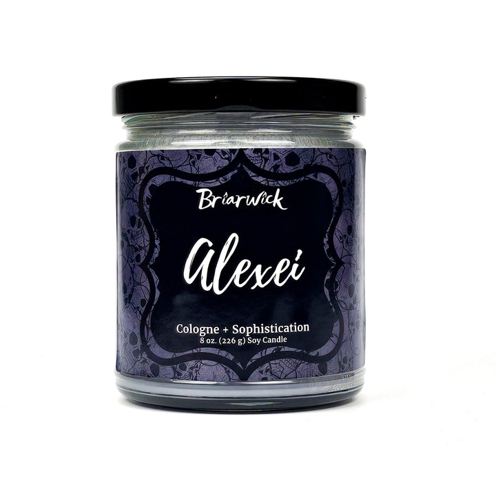Alexei 8oz flint gray candle with gray skull design on a white background
