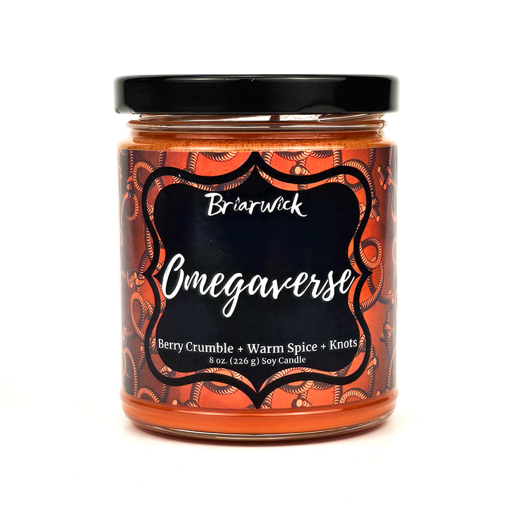 Omegaverse 8oz saffron candle with an orange rope design on a white background