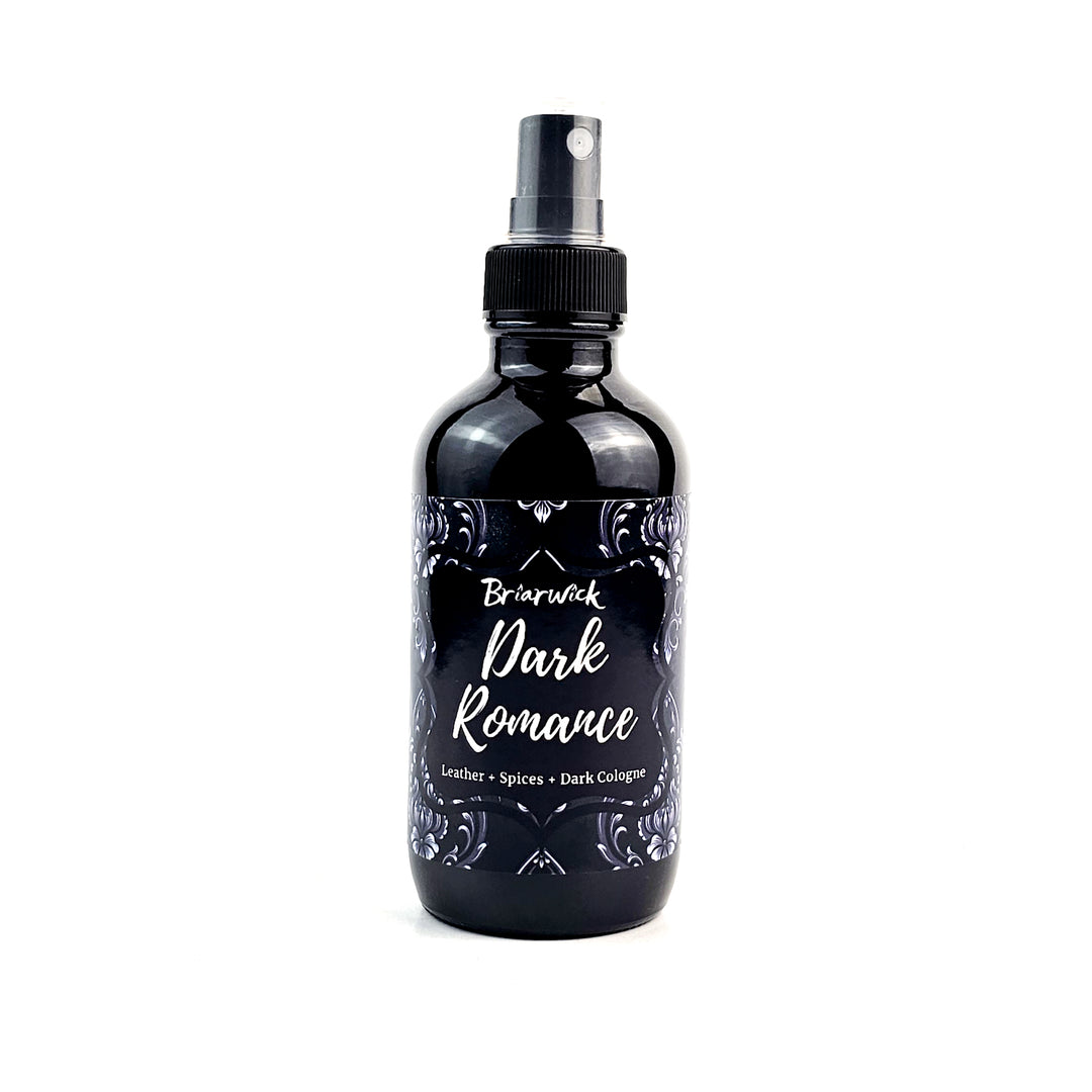 Dark Romance 4oz Linen Spray with gray ornamental design on a white background