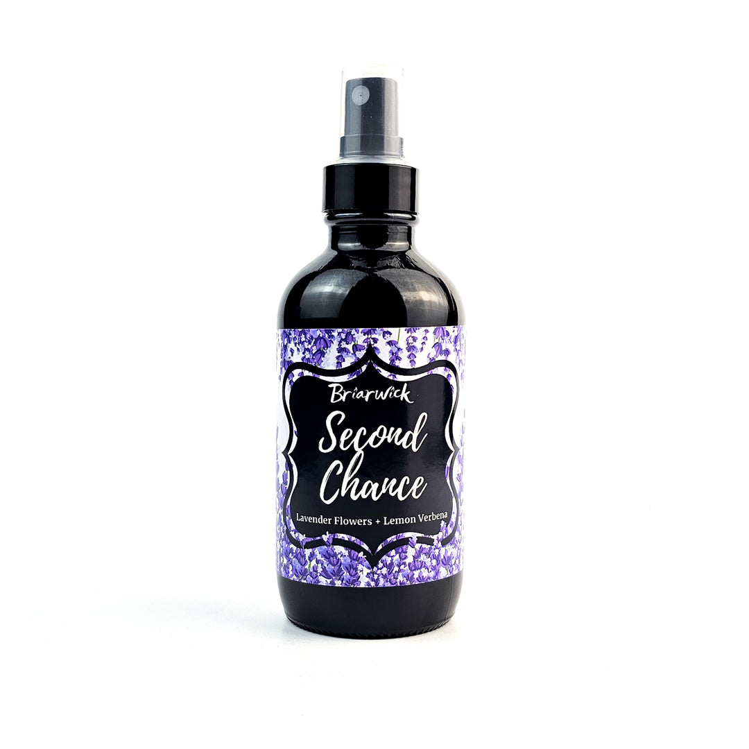 Second Chance 4oz Linen Spray with lavender floral design on a white background