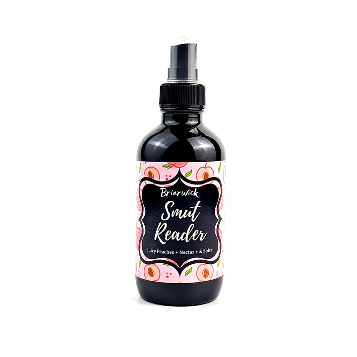 Smut Reader 4oz Linen Spray with pink peach design on a white background