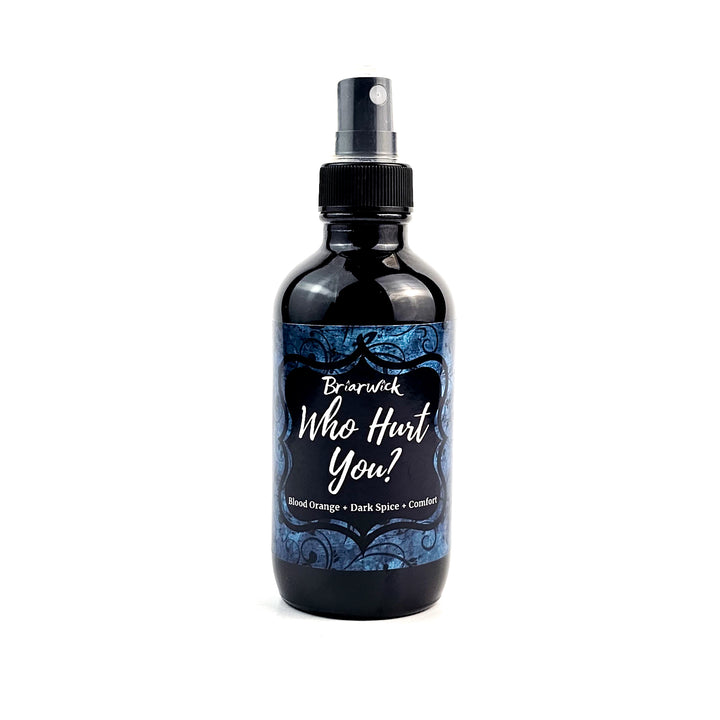 Who Hurt You? 4oz Linen Spray with blue ornamental design on a white background
