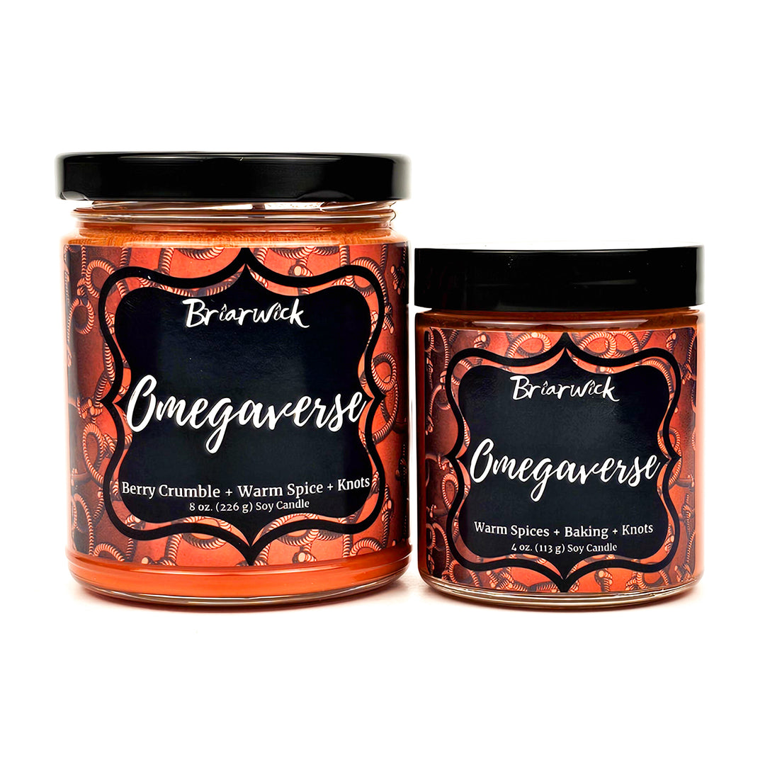 Omegaverse 8oz & 4oz saffron candles with an orange rope design on a white background