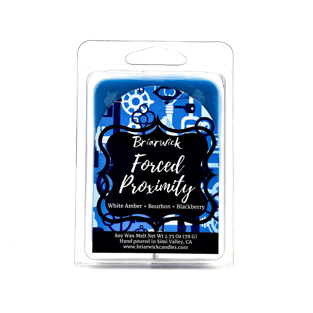 Forced Proximity 2oz steel blue Wax Melt with blue lock & key design on a white background