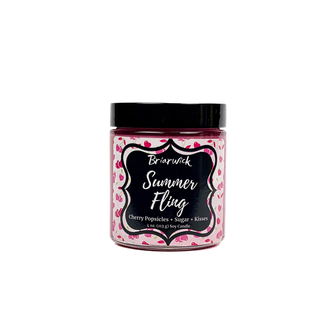 Summer Fling 4oz pastel pink candle with heart pattern design on a white background
