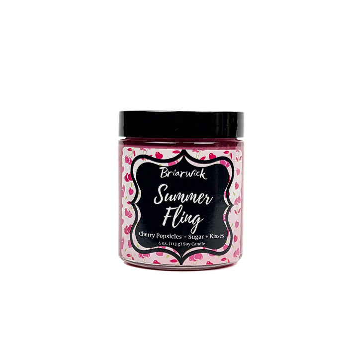 Summer Fling 4oz pastel pink candle with heart pattern design on a white background