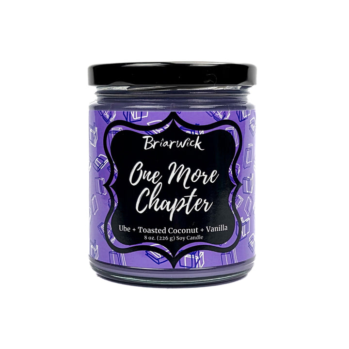One More Chapter 8oz lavender candle with purple book design on a white background
