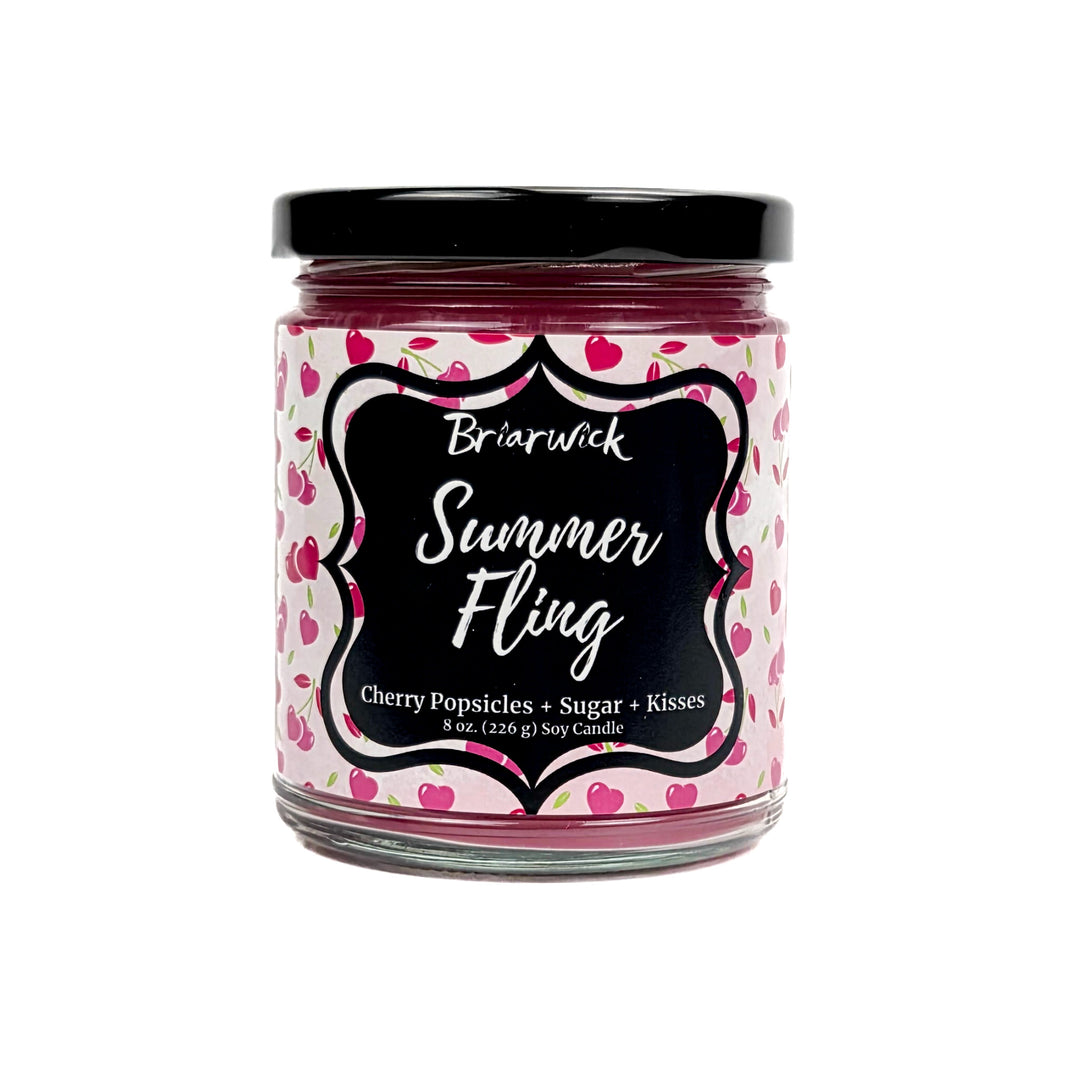 Summer Fling 8oz pastel pink candle with heart pattern design on a white background