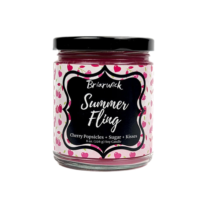 Summer Fling 8oz pastel pink candle with heart pattern design on a white background