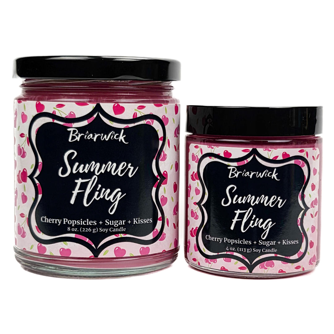 Summer Fling 8oz & 4oz pastel pink candles with heart pattern designs on a white background