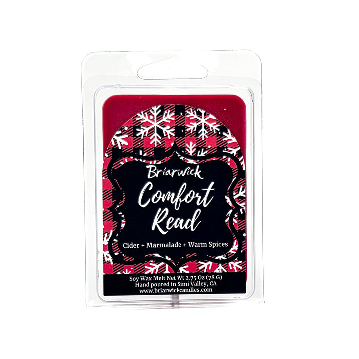 Comfort Read 2oz colored Wax Melt package with red flannel and white snowflake design on a white background