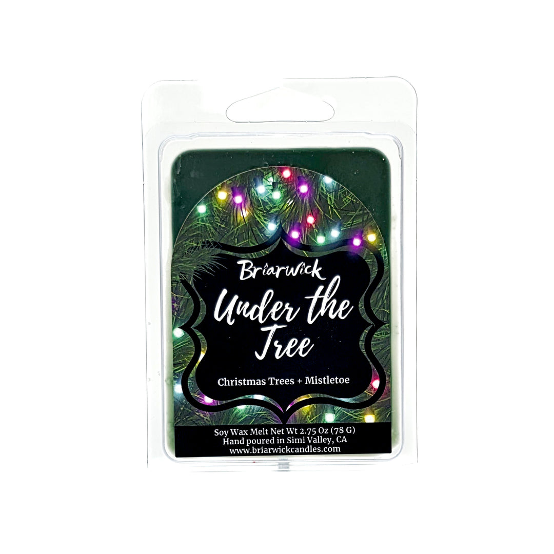 Under the Tree 2oz colored Wax Melt package with christmas tree and colorful lights design on a white background