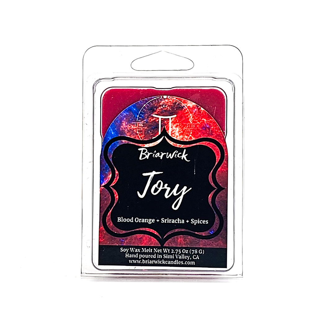 Tory 2oz cherry red Wax Melt with blue galaxy gemini design on a white background