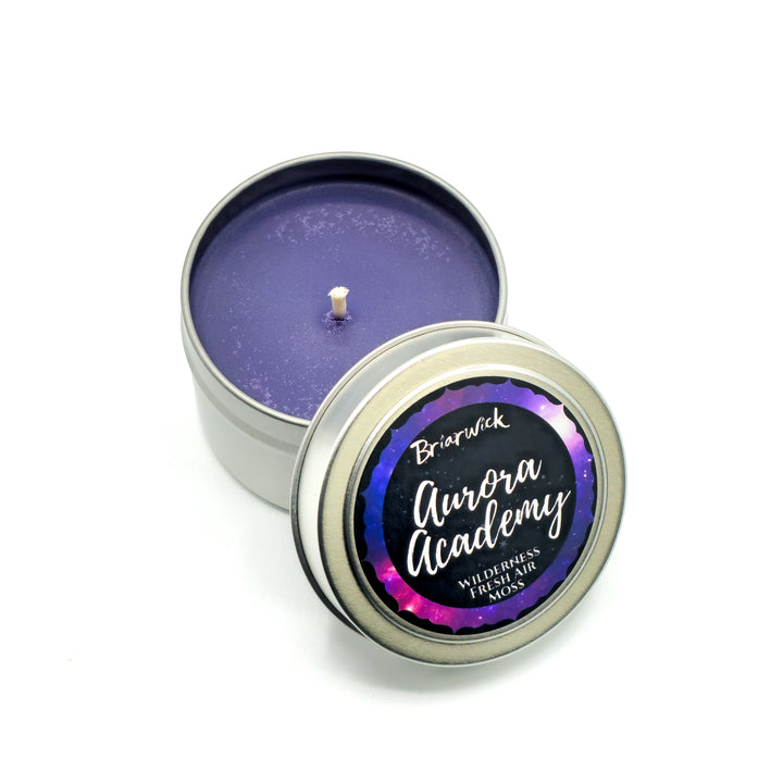 a small tin of purple wax with the lid open