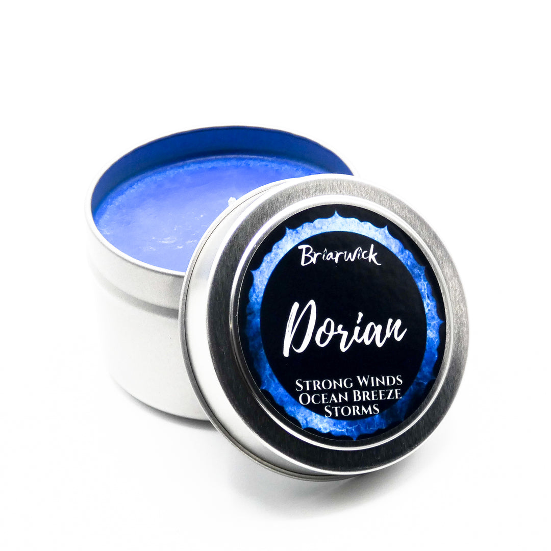 a tin of bright blue color on a white background
