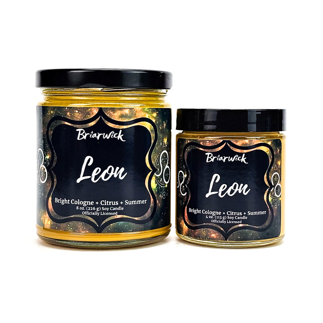 two jars of lemon marmalade on a white background