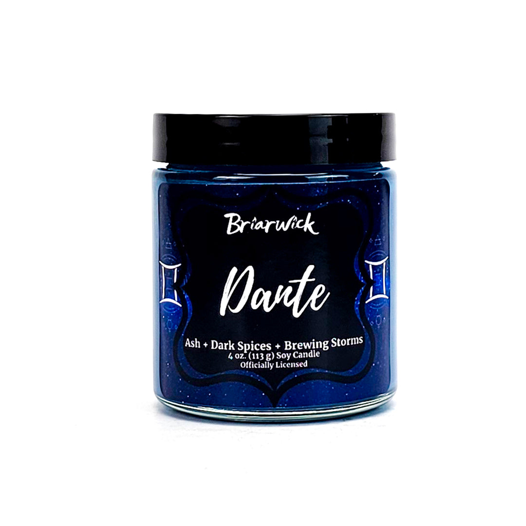 a jar of blue colored powder with a black lid