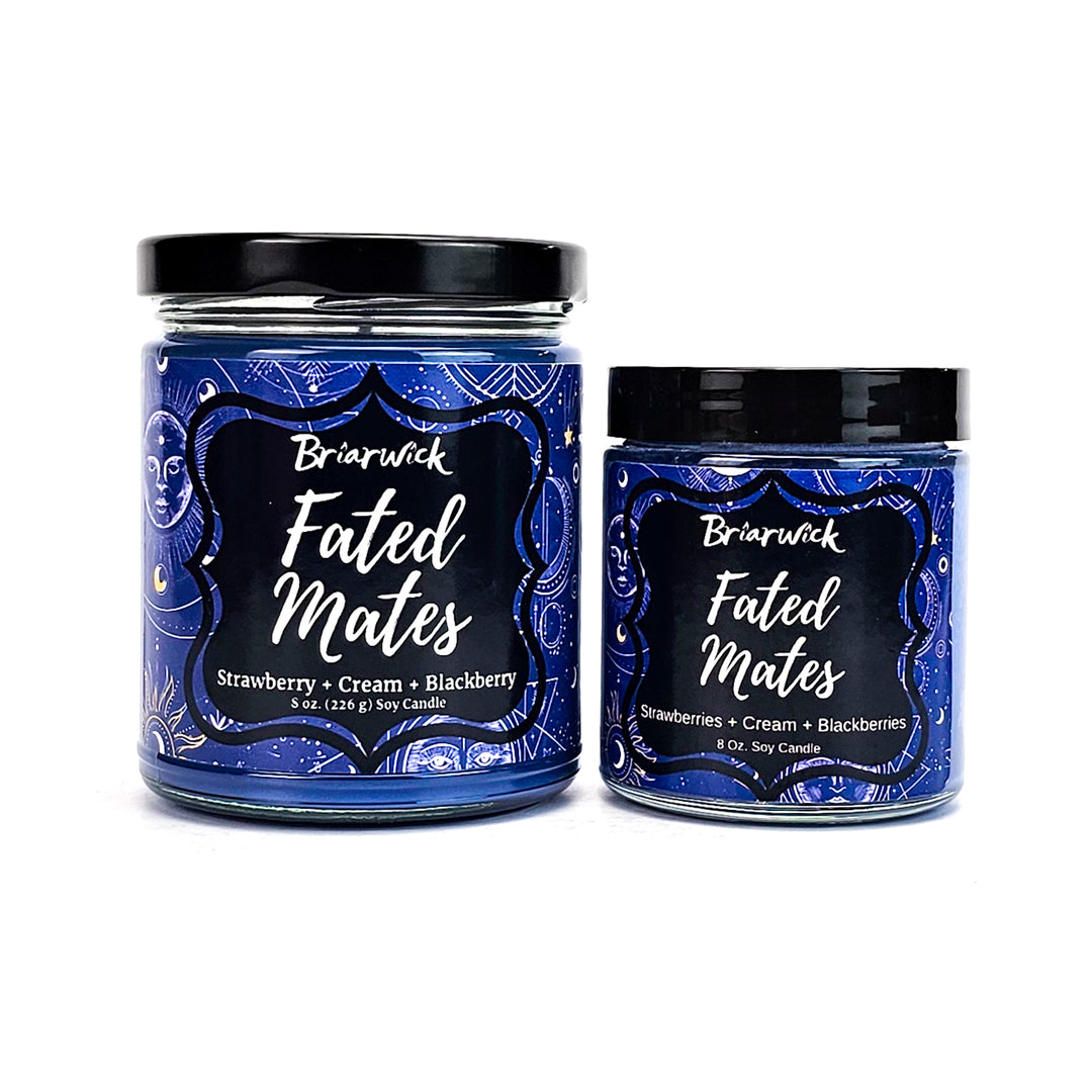 two jars of blue colored candles on a white background