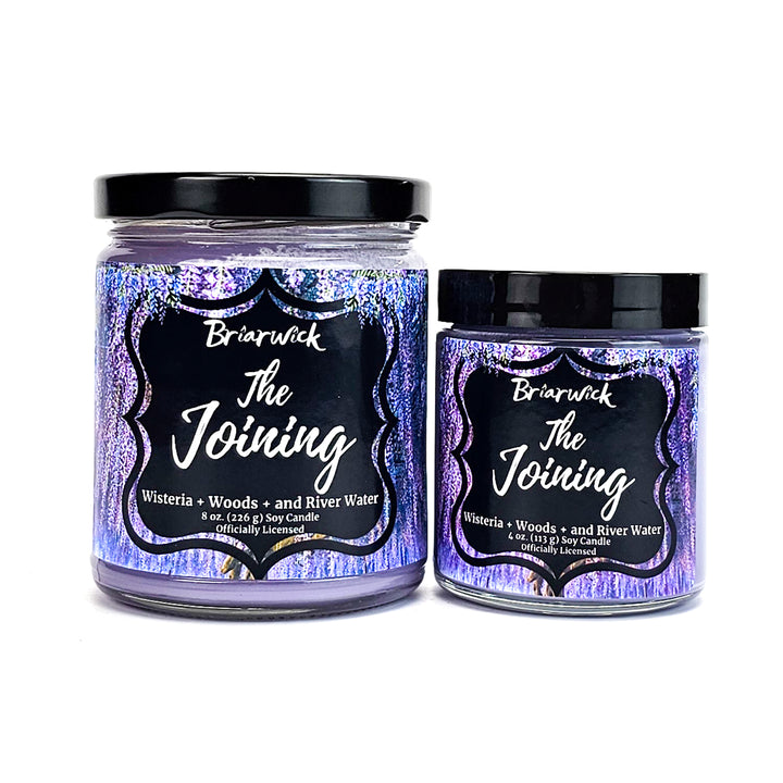 two jars of purple glitter with a black label