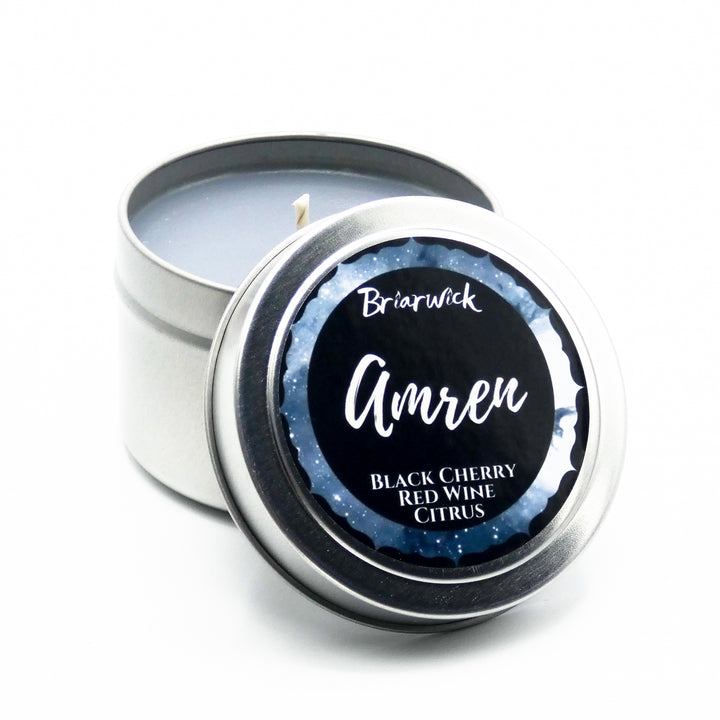 an open tin of black cherry and ginger