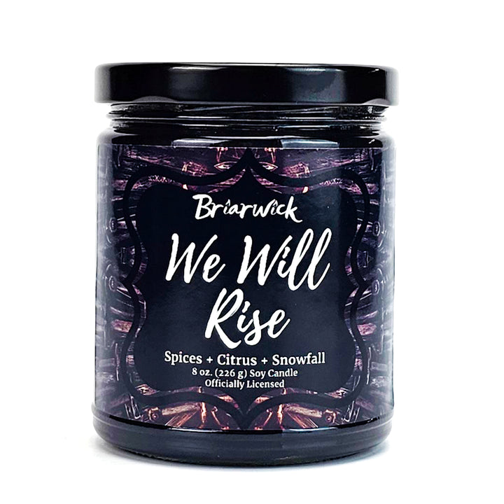 a jar of we will rise spice sits on a white surface