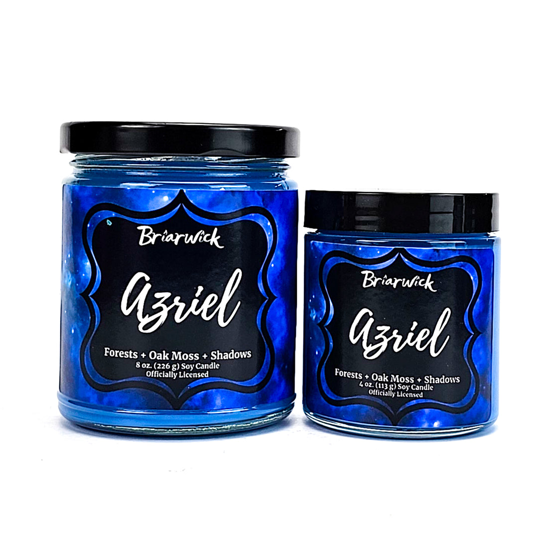 two jars of blue glass with black lids