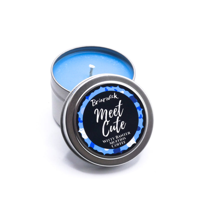 a blue tin with a black label on it