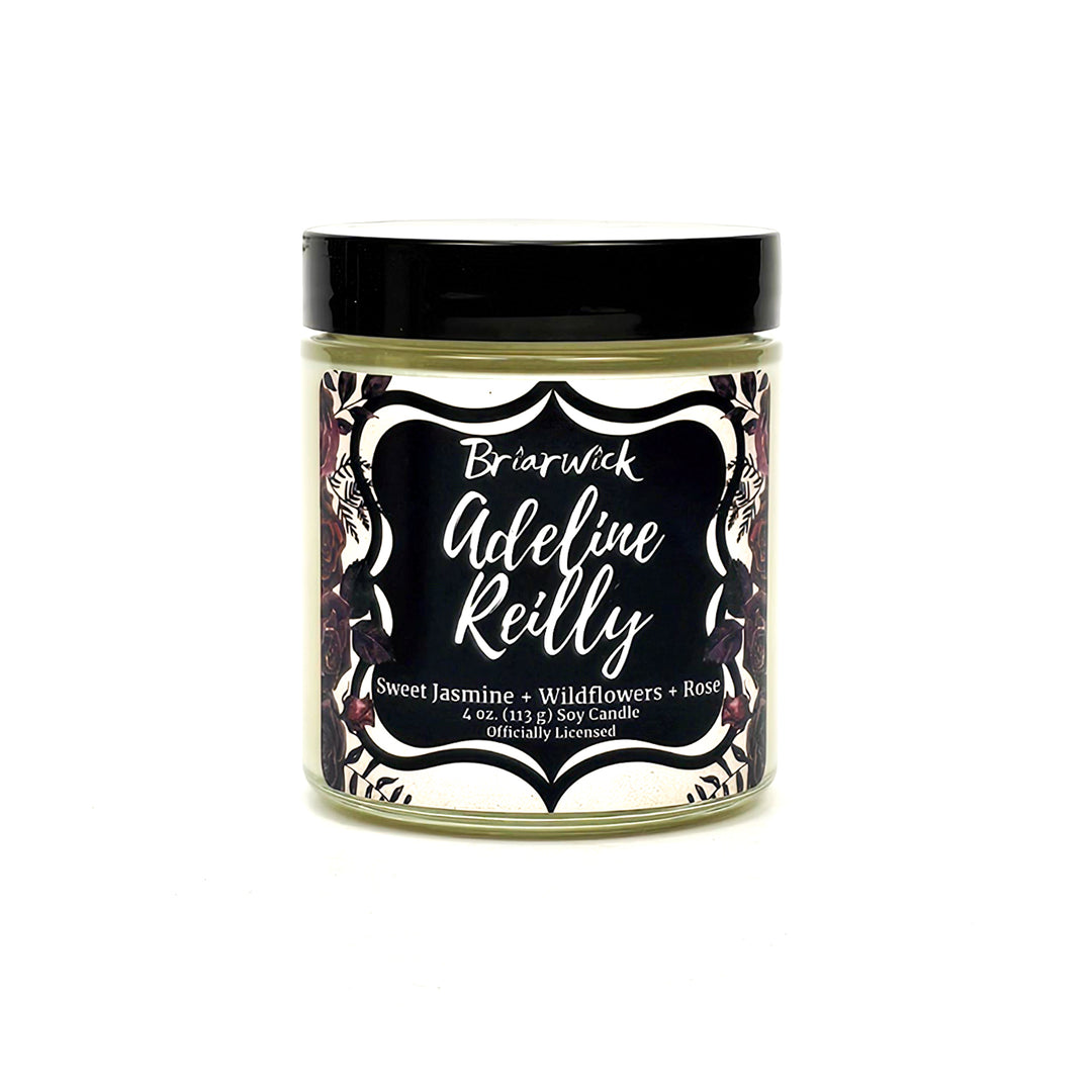 Adeline Reilly 4oz white candle with white floral design on a white background
