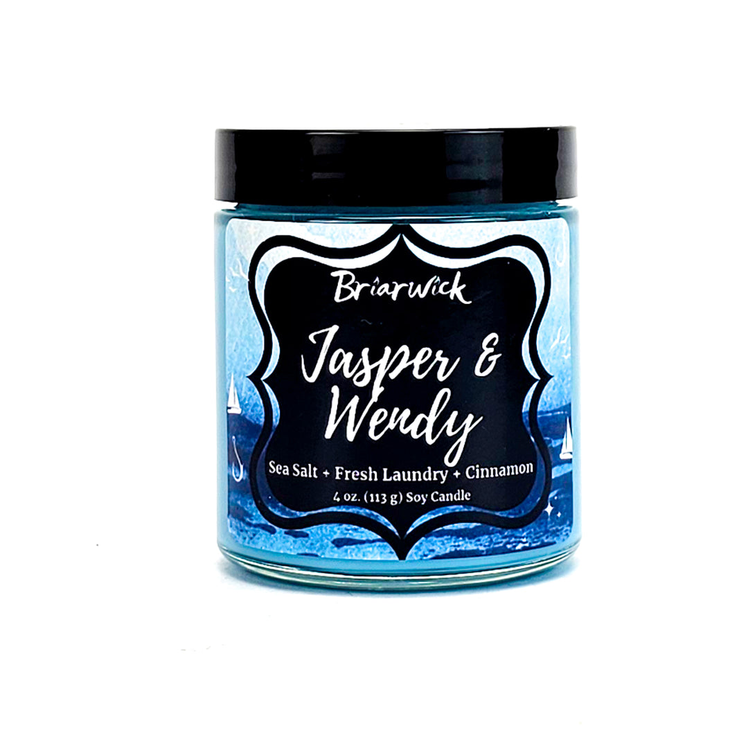 Jasper & Wendy 4oz sky blue candle with blue oceanic design on a white background