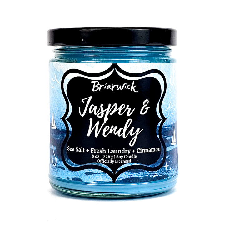 Jasper & Wendy 8oz sky blue candle with blue oceanic design on a white background