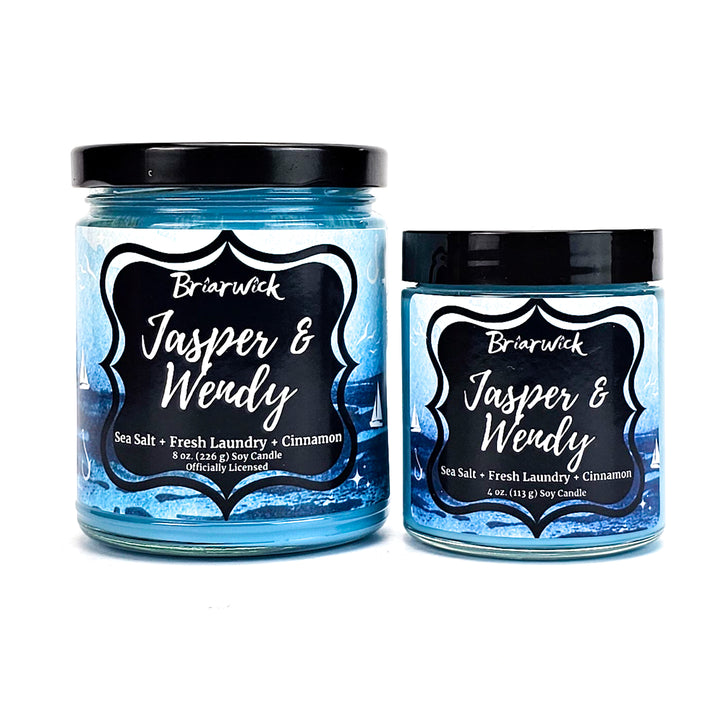 Jasper & Wendy 8oz sky blue candle with blue oceanic design on a white background