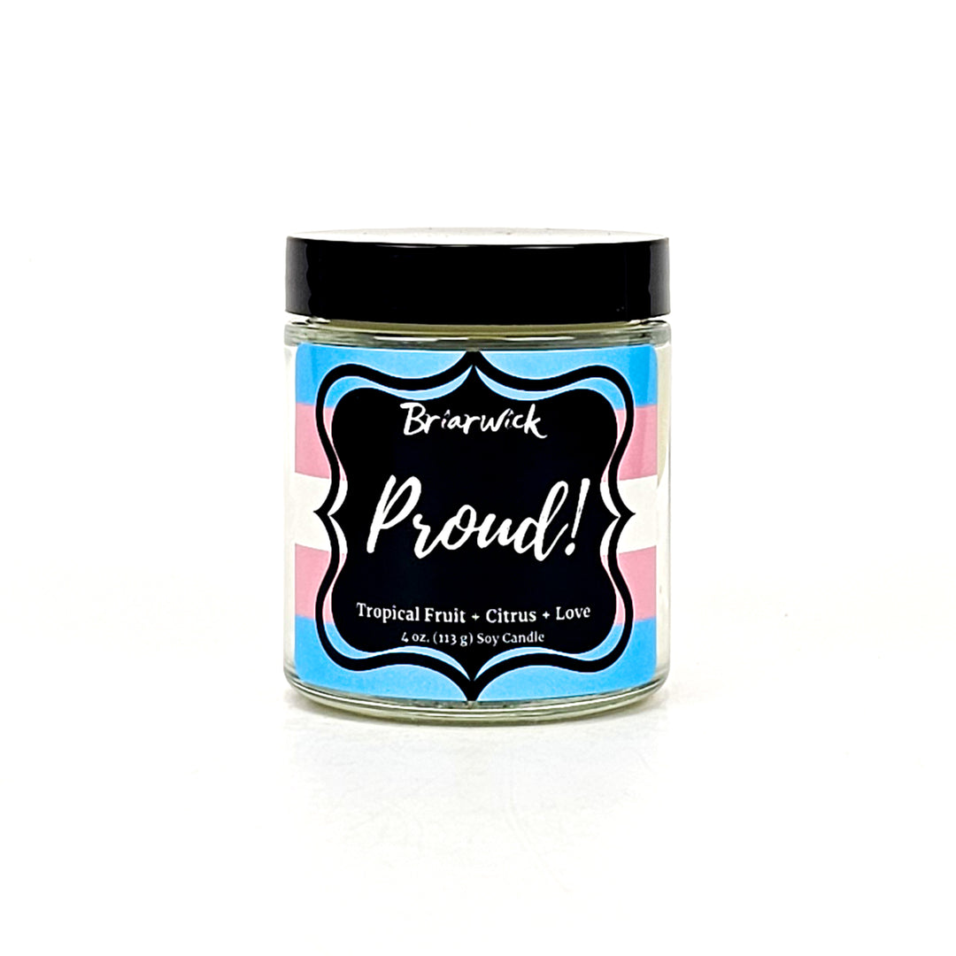 PROUD! 4oz white candle with transgender pride flag on a white background