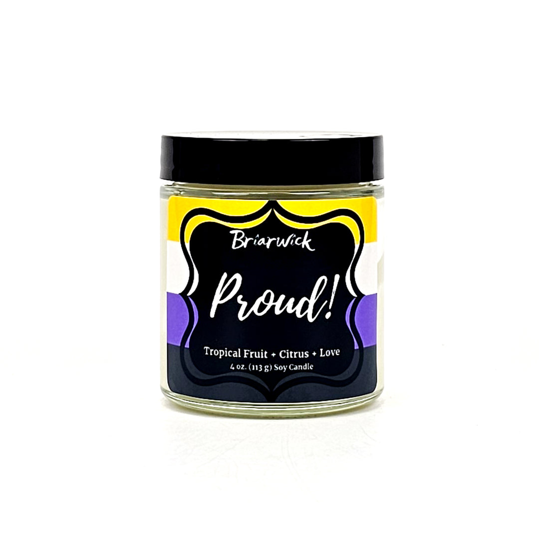 PROUD! 4oz white candle with nonbinary pride flag on a white background